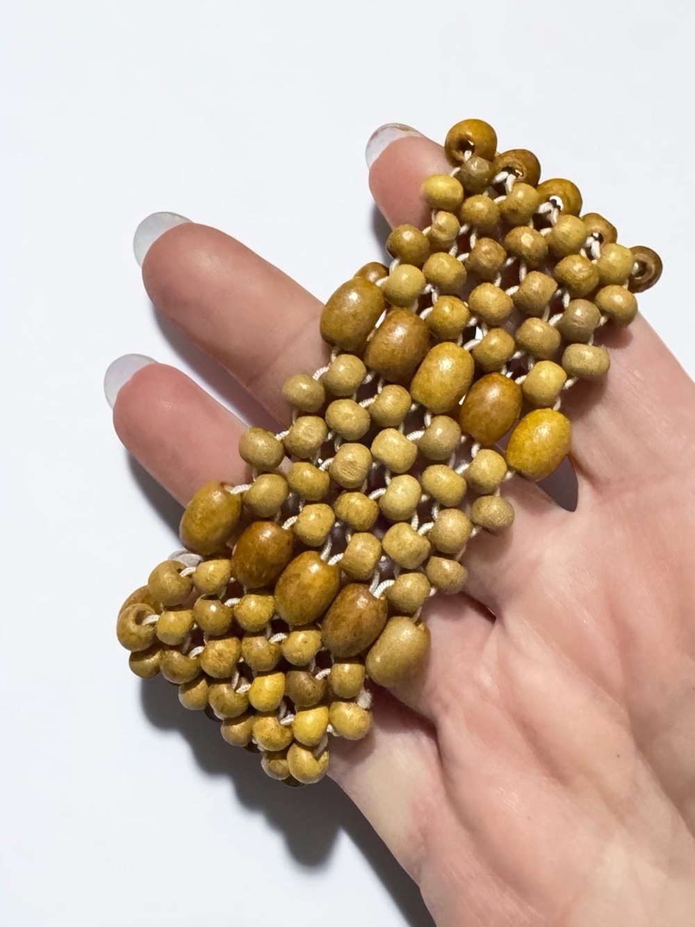 Boheium -style woven wooden bead cuff bracelet.